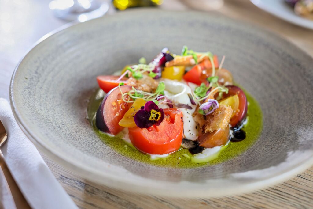 The Francis Hotel Bath Isle of wight tomato salad, burrata cheese, croutons, wild garlic pesto close up